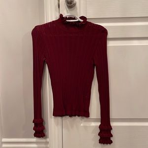 Ruffle knit turtleneck